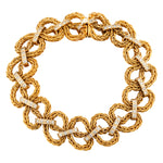 "Birks" 18kt Yellow Gold and Diamond Bracelet. Weight: 60.7 grams.