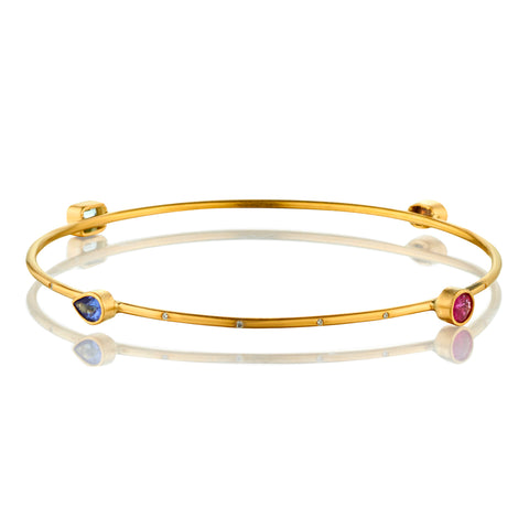 18kt Yellow Gold Thin Bangle Featuring Assorted Colored Stones and Diamonds.