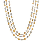 14kt Yellow and White Gold Triple Diamond Strand Tennis Necklace. 6.00ct Tcw