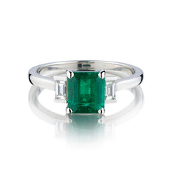 Platinum Natural Green Emerald and 3 Stone Diamond Ring. GIA Certificate