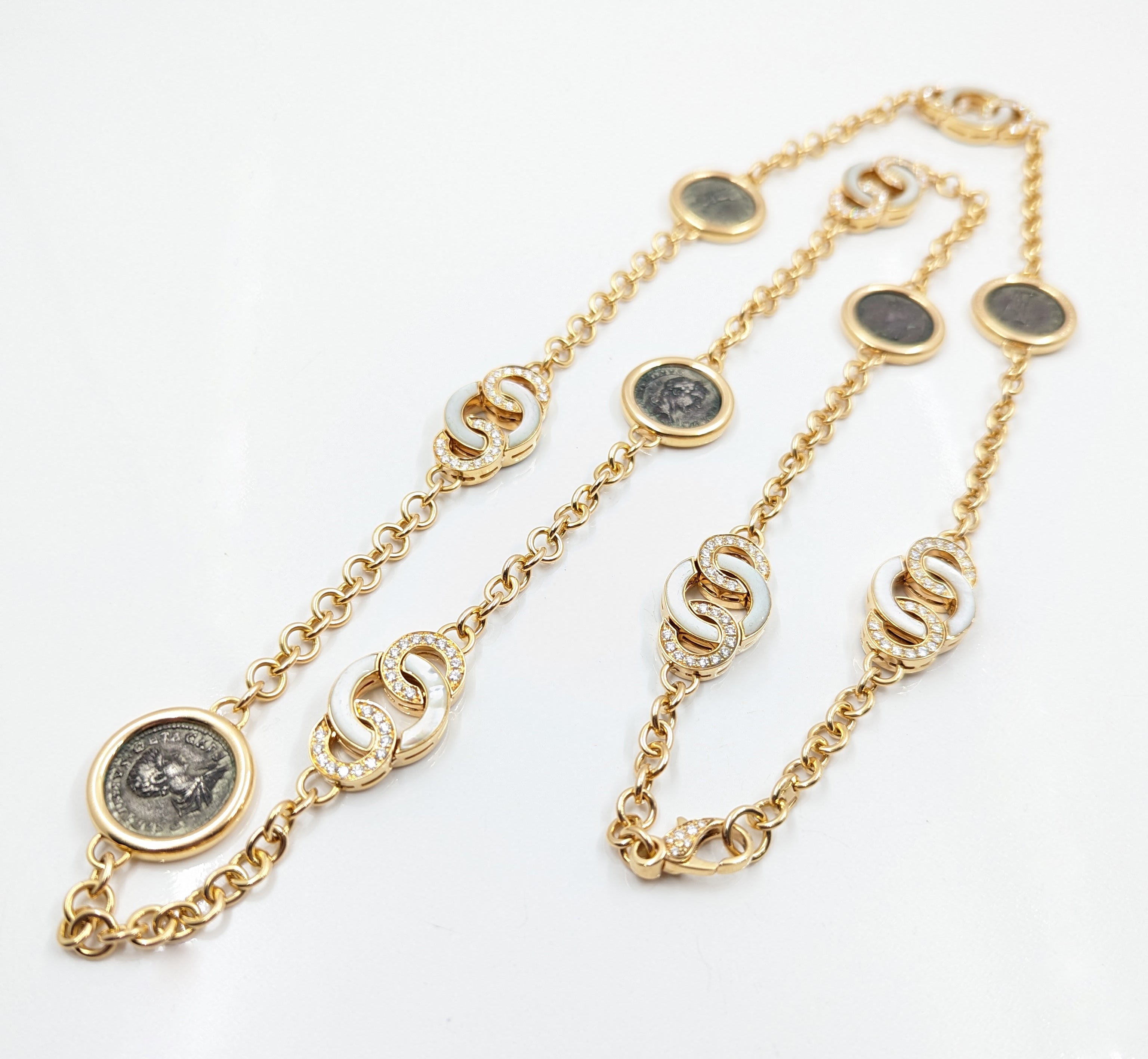 Authentic Bvlgari "Monete" Coin Necklace. 36"(L).Weight: 138 grams.