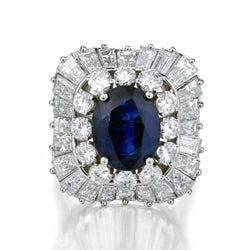 Ladies Platinum Blue Sapphire and Diamond Ballerina ring.