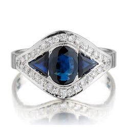 1.00 Carat Oval Cut Sapphire And Diamond Platinum Dress Ring