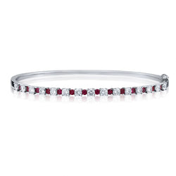 Ladies 18kt White Gold Ruby and Diamond bangle.