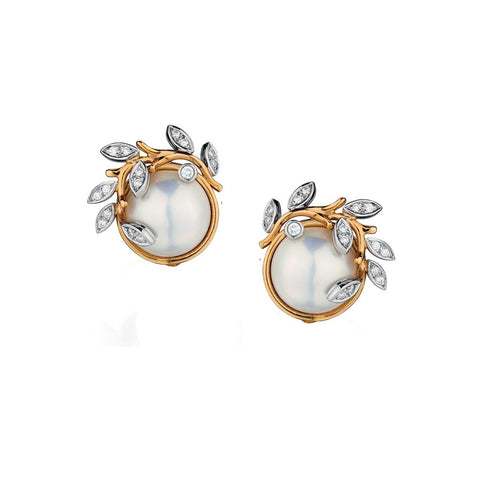Tiffany & Co  "Paloma Picasso" Olive Leaf pearl and diamond earings.