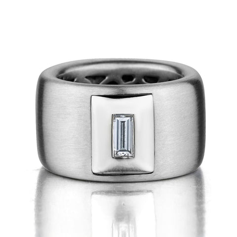 Ladies 18kt Custom made white gold band featuring a Baguette cut diamond