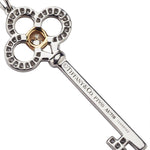Tiffany & Co. Diamond & Yellow Diamond Crown Key Pendant