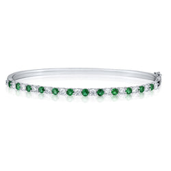 Ladies 18kt W/G Green Emerald and Diamond Bangle.