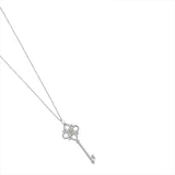 Tiffany & Co. Platinum White And Pink Diamond Floret Key Pendant Necklace