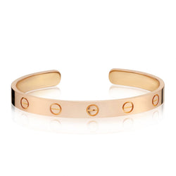 Cartier  "Love Collection" Cuff Bangle. 18kt Rose Gold. Size 16