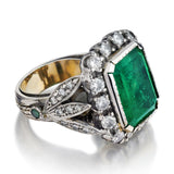 Mid-Century 15.00 Carat Green Emerald And Diamond Halo-Set Ring