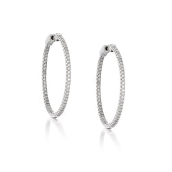Ladies 18kt white gold diamond hoop earings. 1.20ct Tw