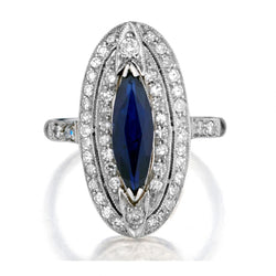 LADIES Platinum vintage Diamond and Blue Sapphire ring.