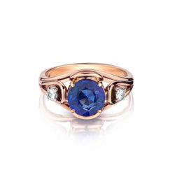 Ladies 18kt Rose Gold Blue Sapphire and Diamond Ring