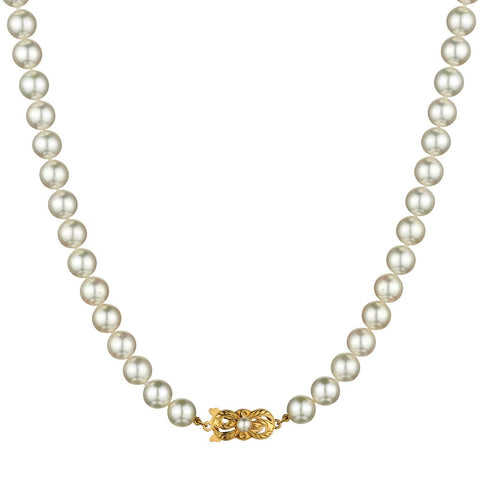 Mikimoto 7.5 - 8mm Cultured Pearl Strand. 18" in length. 18kt Mikimoto Clasp