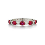 Ladies 18kt White Gold Diamond And Ruby Band.