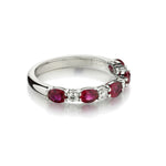 Ladies 18kt White Gold Diamond And Ruby Band.