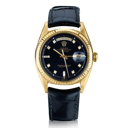 ROLEX DAY-DATE in 18kt Yellow Gold . Black Diamond Dial.