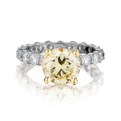 Ladies Platinum and Diamond Natural Fancy Yellow Brilliant Cut Diamond Ring. 5.58 TCW
