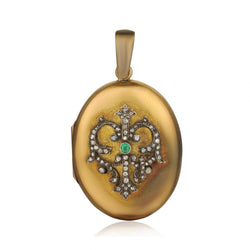 Vintage Large 14kt Yellow Gold Locket. Crest set with Mine Cuts and Green Emerald.