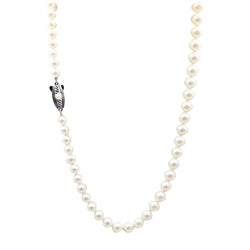 Mikimoto Graduated Pearl Necklace. 21" in Length