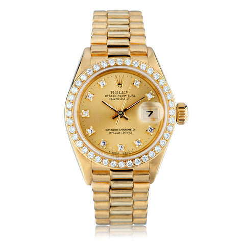 Ladies Rolex Presidential in 18kt Yellow Gold. Factory Diamond Dial and Bezel. Ref: 69178.