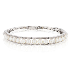 Ladies Platinum Diamond and Pearl Bracelet. Edwardian Era.