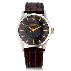 Rare!! Steel Rolex Oyster Perpetual. Tropical Dial. Bubbleback. Ref: 6332. Circa 1950's