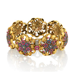 Floral Ruby and Blue Sapphire and Diamond Bracelet in 18kt Yellow Gold.
