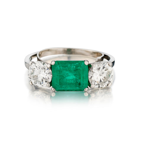Platinum Classic Green Emerald and Diamond Ring.
