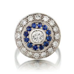18kt White Gold Diamond and Blue Sapphire Circular Style Ring.