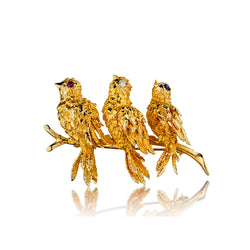 Three Birds Perched on a Branch Brooch in 14kt Yellow Gold.