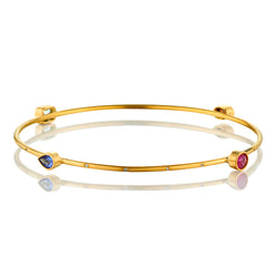 18kt Yellow Gold Thin Bangle Featuring Assorted Colored Stones and Diamonds.