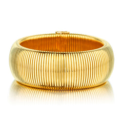 Magnificent 18kt yellow Gold Wide Tubagos Bracelet. 101.2 grams.
