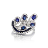18kt White Gold Blue Sapphire and Diamond Ring.