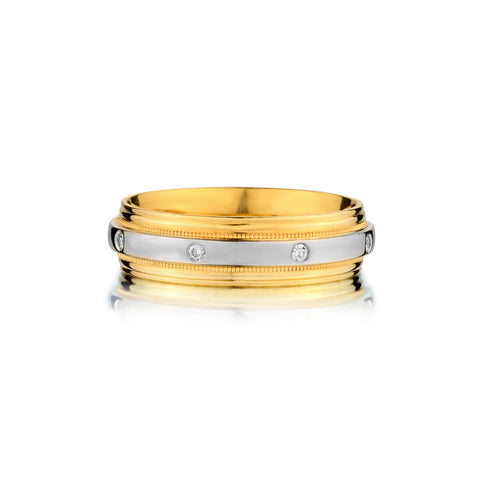 Platinum and 18kt Yellow Gold Diamond Band.
