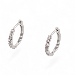 18kt white gold and diamond huggie hoop earring.