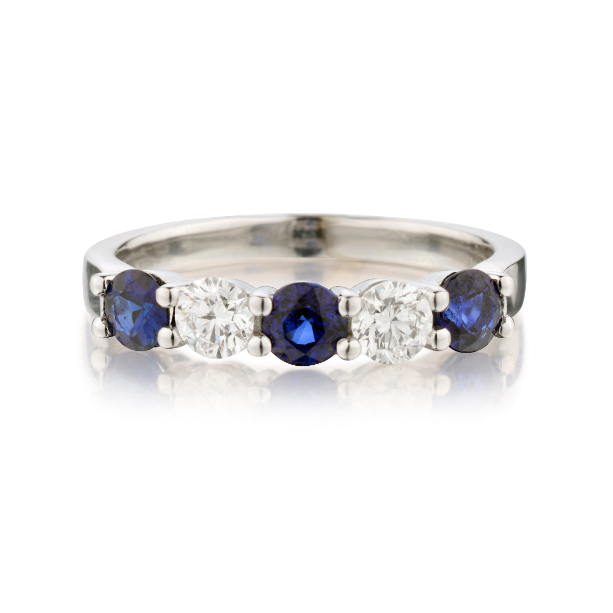 Ladies 18kt White Gold Blue Sapphire and Diamond Ring.