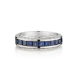 Ladies 18kt White Gold Blue Sapphire and Diamond Band.