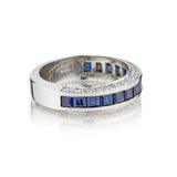 Ladies 18kt White Gold Blue Sapphire and Diamond Band.