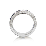 Ladies 18kt White Gold Blue Sapphire and Diamond Band.