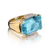Handmade 18kt Yellow Gold Blue Topaz and Diamond Ring.