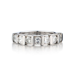 Ladies 14kt White Gold Diamond Band. 7 x 1.00ct Tw