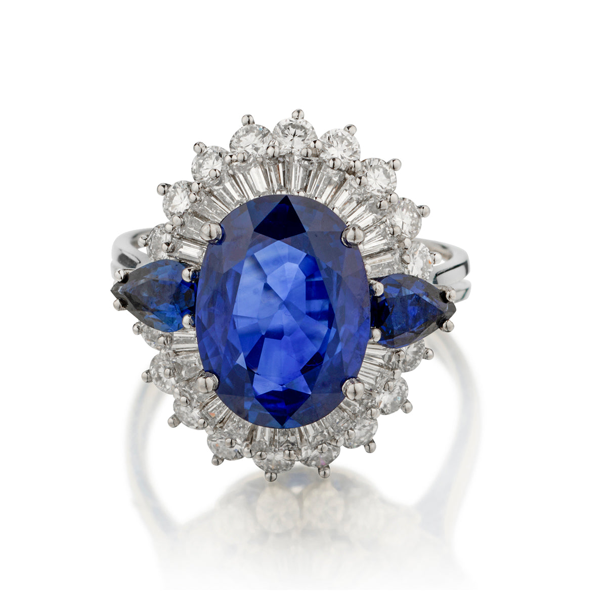 Platinum Blue Sapphire and Diamond Cluster Ring. 5.50 Oval Cut