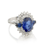 Platinum Blue Sapphire and Diamond Cluster Ring. 5.50 Oval Cut