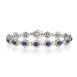 Ladies 18kt White Gold Diamond And Blue Sapphire Bracelet.