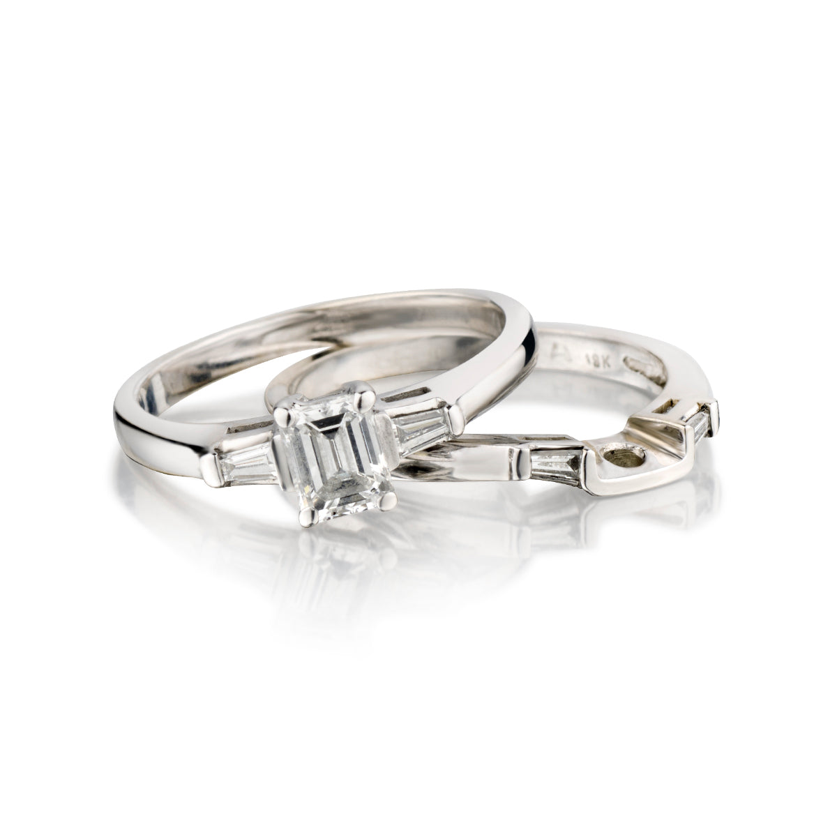 18kt White Gold Wedding Set. 0.50 Emerald Cut Diamond