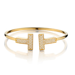 Tiffany & Co 18kt Yellow Gold Wide Diamond Wire T Bangle.