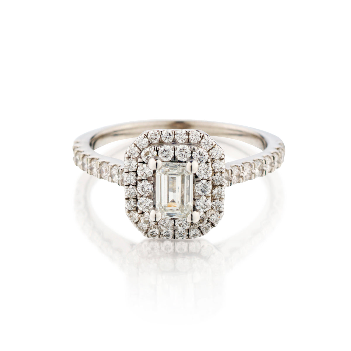 18kt White Good Diamond Ring. Natural 0.45 Emerald Cut Diamond