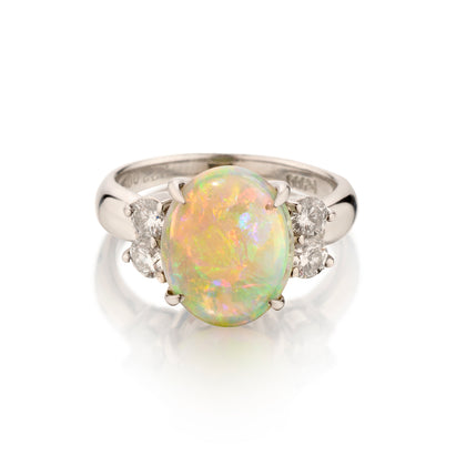 Ladies Platinum Fiery Opal and Diamond Ring.